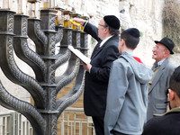 Lighting the Kotel Menorah
